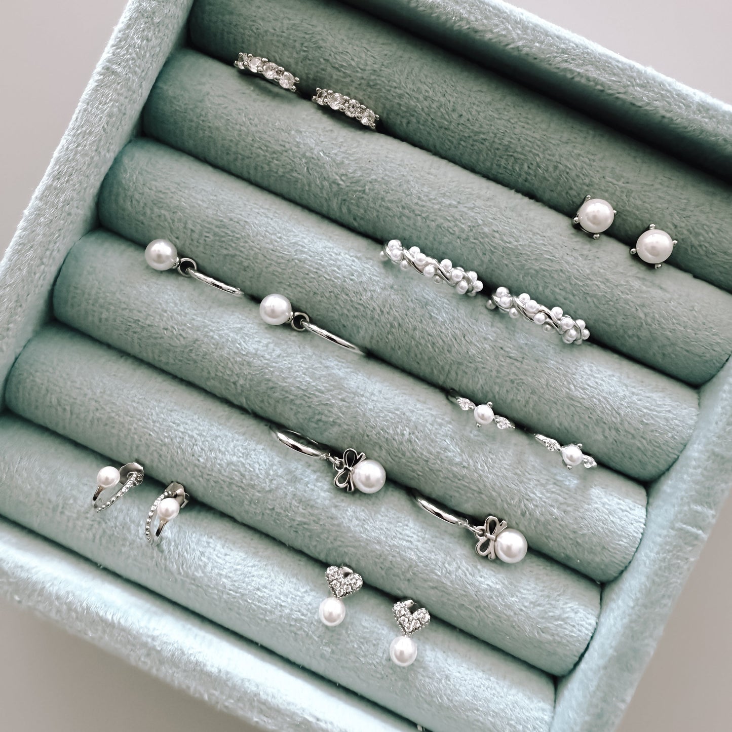 Crystal heart studs with pearl