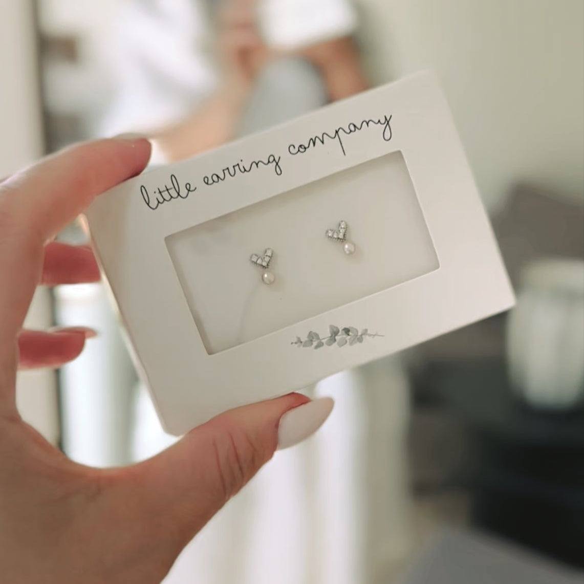 Crystal heart studs with pearl