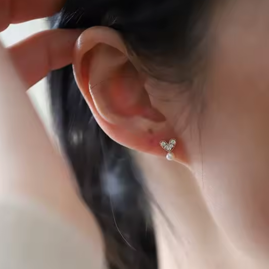 Crystal heart studs with pearl
