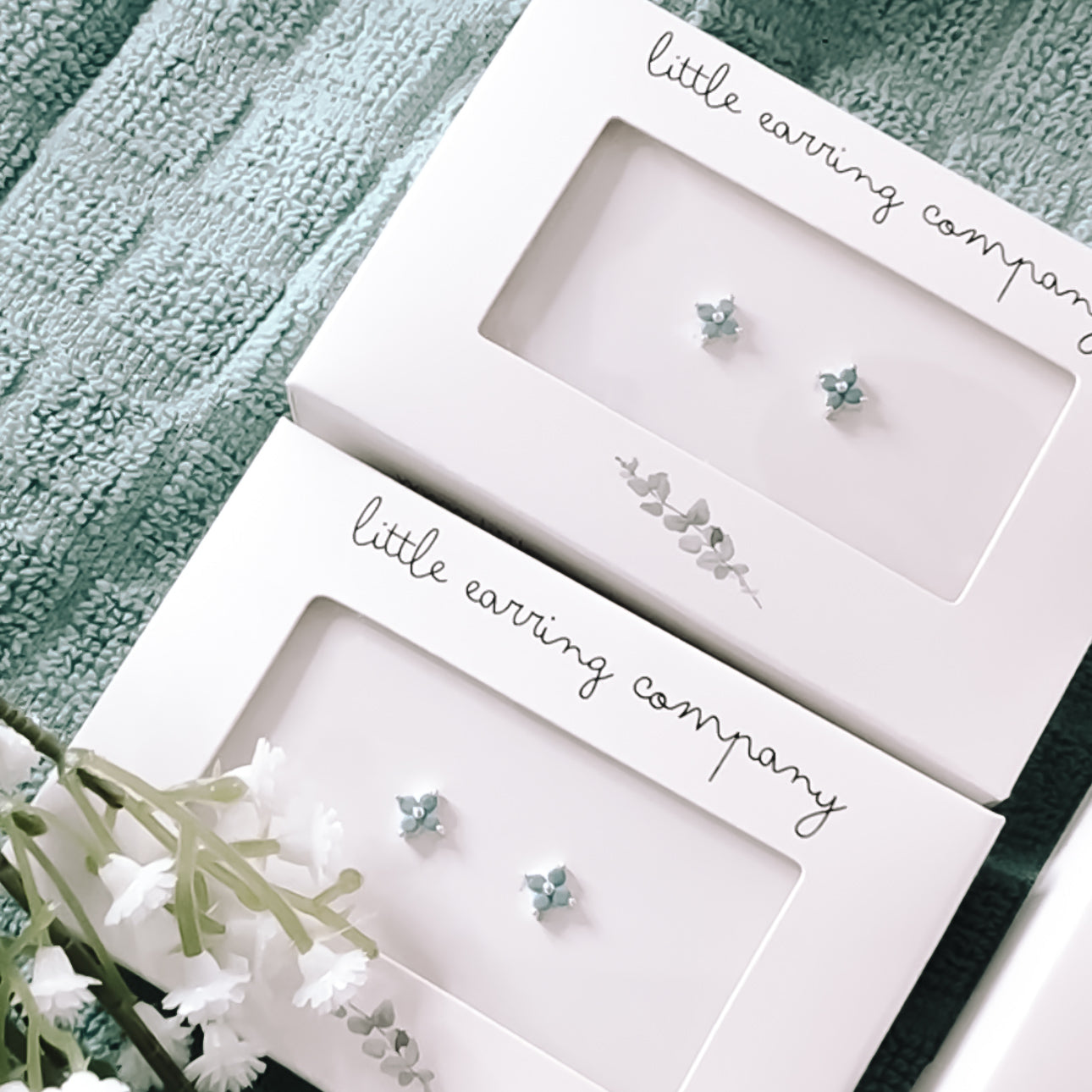 Blue crystal flower studs