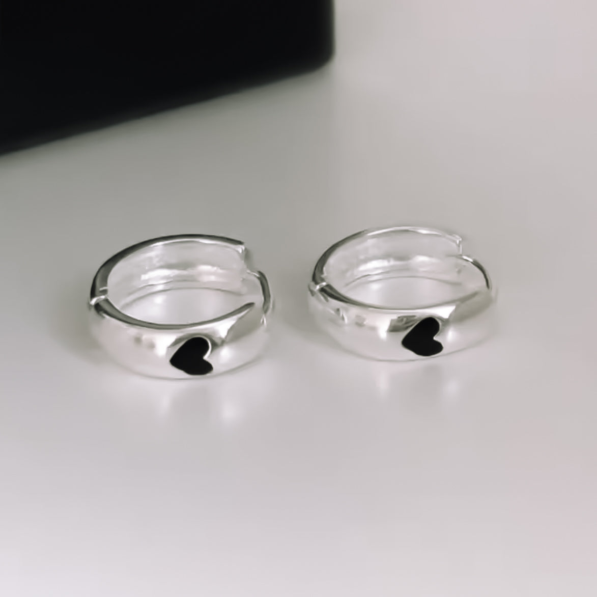 Huggie with subtle black heart