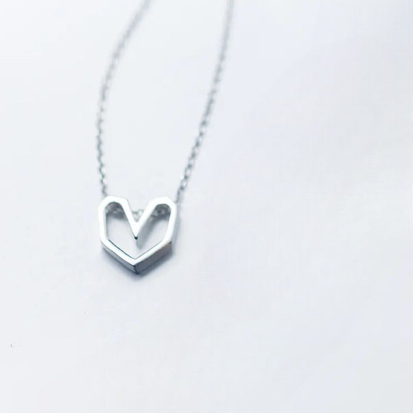 Geometric heart charm necklace